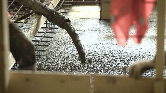 concrete mix is feeding into the formwork by pump in monolithic construction in a on object under construction