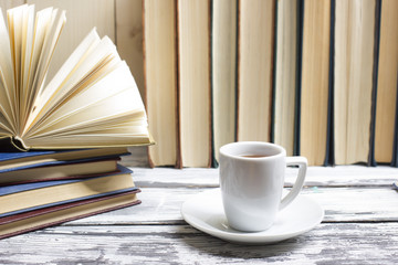 Open book, hardback books on wooden table. Back to school. Copy space