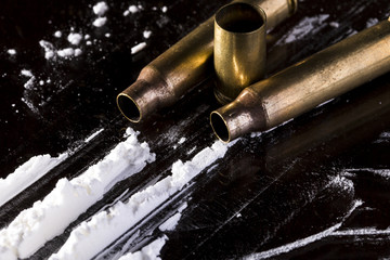 Obraz na płótnie Canvas White powder (cocaine) on glass table