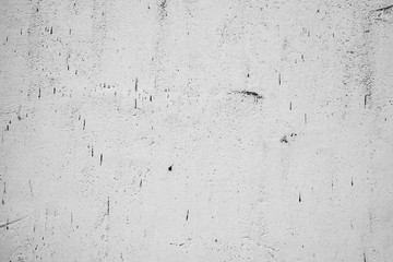 Wall fragment with scratches and cracks