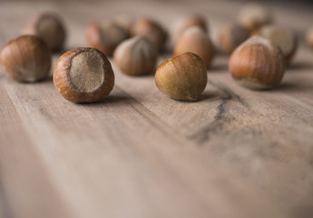 Hazelnuts on wooden background
