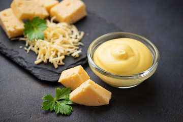 Homemade cheese sauce in glass bowl
