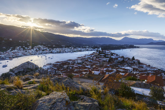 Fototapeta View of the Chora village of Poros island and Galatas village in Peloponnese, Greece.   