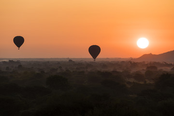 Hot air balloons with tourist are ready for fly to enjoy sunrise over Bagan in Myanmar