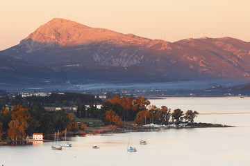 View of the coast of Peloponnese peninsula from Poros island in Greece. 
