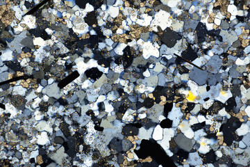 Colorful micro crystals of rock in polarized light