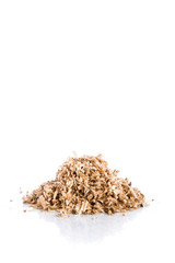 Oak wood shavings on white background, shadows and reflections, wood waste, space for text