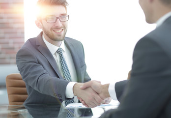 Fototapeta premium welcome and handshake business partners