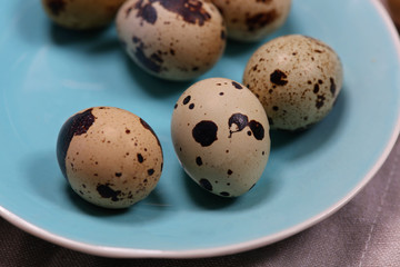 Raw uncooked Quail Eggs. Healthy eating concept