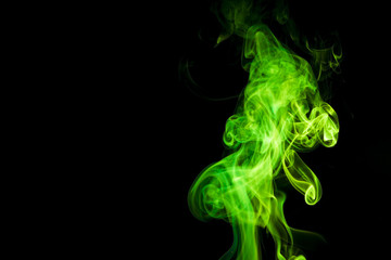 Green smoke on black background