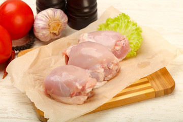Boneless raw chicken thighs