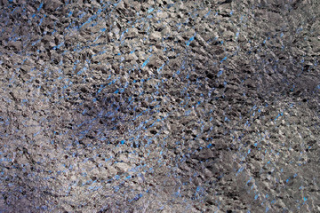 Silver foil, tightly textured black, grey and silver flecked background