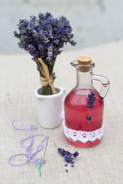 Bottle Of Lavender Syrup And Lavender Flowers