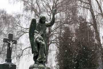 Cemetery covered by snow in winter. Slovakia
