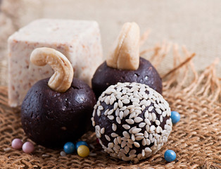 Oriental sweets from sesame on an old background of cloth.