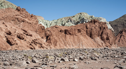 Rainbow Valley (Valle Arcoiris), in the Atacama Desert in Chile. The mineral rich rocks of the...