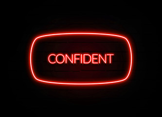 Confident neon sign on brick wall background.