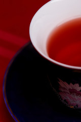 Cup of tea on the red table