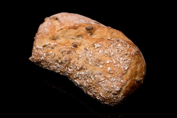 bread roll, bread on a black background, isolated