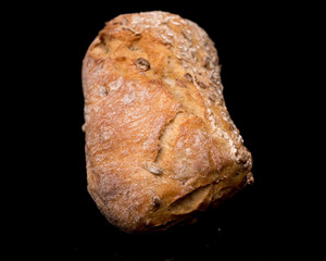 bread roll, bread on a black background, isolated