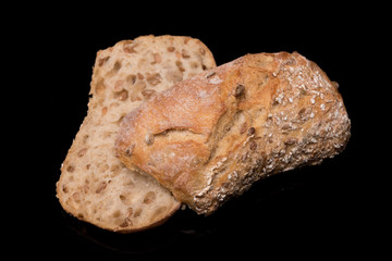 bread roll, bread on a black background, isolated