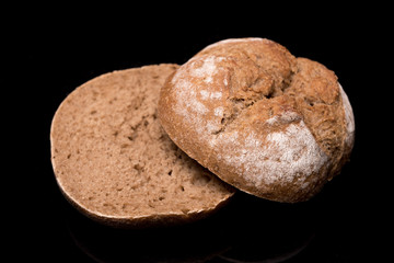 bread roll, bread on a black background, isolated
