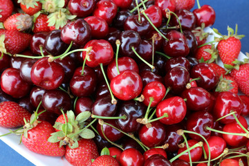 Strawberry and Cherry on a Plate closeup