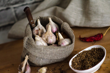 Raw garlic in the bag with spices- chilli pepper and coriander