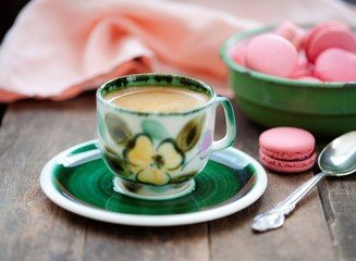 Macarons  with a cup of coffee