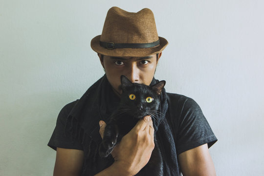 Portrait of a  Love to animals with black cat.