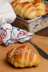 Freshly baked croissants on the table