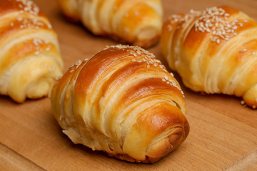 Freshly baked croissants on the table