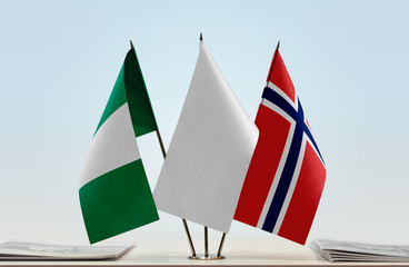 Flags of Nigeria and Norway with a white flag in the middle