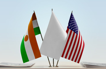 Flags of Niger and USA with a white flag in the middle