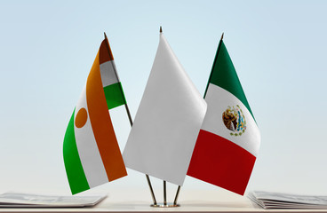 Flags of Niger and Mexico with a white flag in the middle