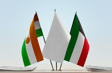 Flags of Niger and Kuwait with a white flag in the middle