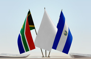 Flags of Republic of South Africa and El Salvador with a white flag in the middle