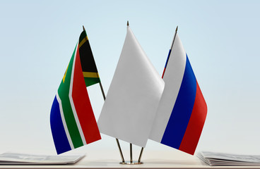 Flags of Republic of South Africa and Russia with a white flag in the middle