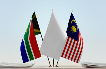 Flags of Republic of South Africa and Malaysia with a white flag in the middle