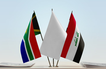 Flags of Republic of South Africa and Iraq with a white flag in the middle