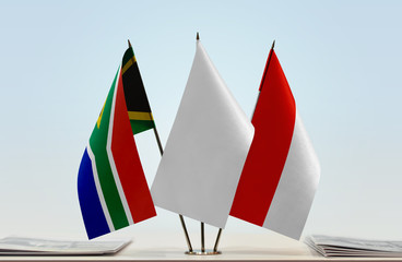Flags of Republic of South Africa and Indonesia with a white flag in the middle