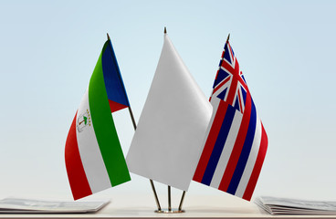 Flags of Equatorial Guinea and Hawaii with a white flag in the middle