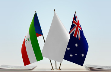 Flags of Equatorial Guinea and Australia with a white flag in the middle