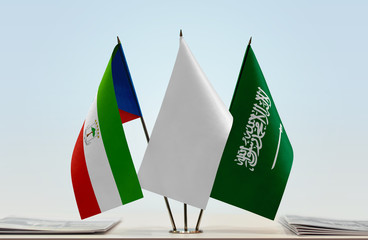 Flags of Equatorial Guinea and Saudi Arabia with a white flag in the middle