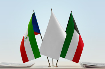 Flags of Equatorial Guinea and Kuwait with a white flag in the middle