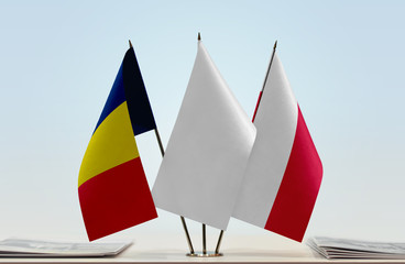 Flags of Chad and Poland with a white flag in the middle