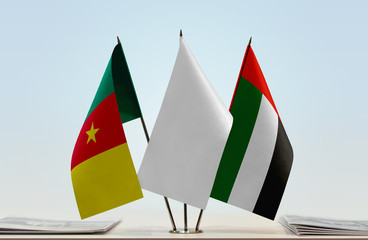 Flags of Cameron and UAE with a white flag in the middle