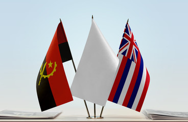 Flags of Angola and Hawaii with a white flag in the middle