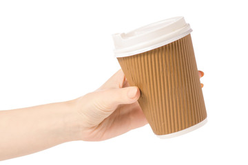 Cardboard glass cup of coffee in hand