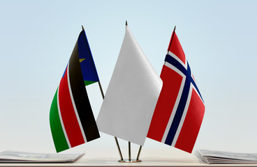 Flags of South Sudan and Norway with a white flag in the middle